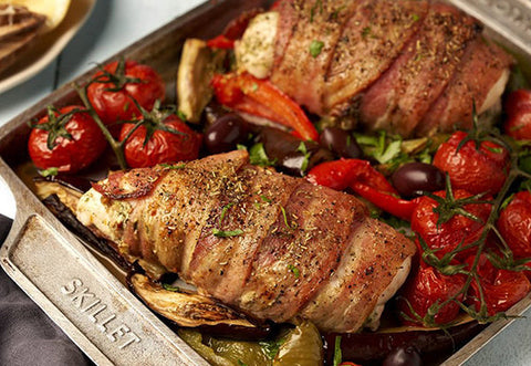 Mediterranean bacon wrapped roast chicken breasts